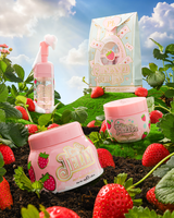 P.Louise Strawberry Obsessed For Less Double Cleanse & Moisturise Skincare Set σε έναν καταπράσινο λόφο που περιβάλλεται από φράουλες