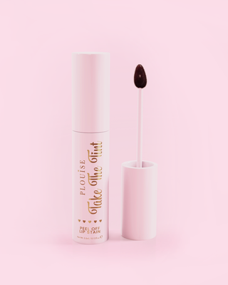 Pink P.Louise Take The Tint peel off lip stain in a nude pink shade on a pink background