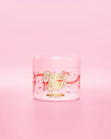 Μια ροζ μπανιέρα P.Louise ή Baddie Buff Scalp and Body Sugar Scrub σε Coconut Coast