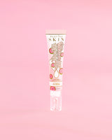 Tube of P. Louise Dose Of Dreams Βιταμίνη C Brightening Eye Cream σε ροζ φόντο